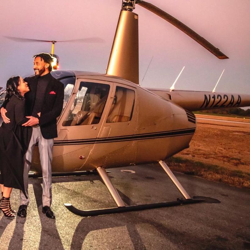 a man standing in front of a plane