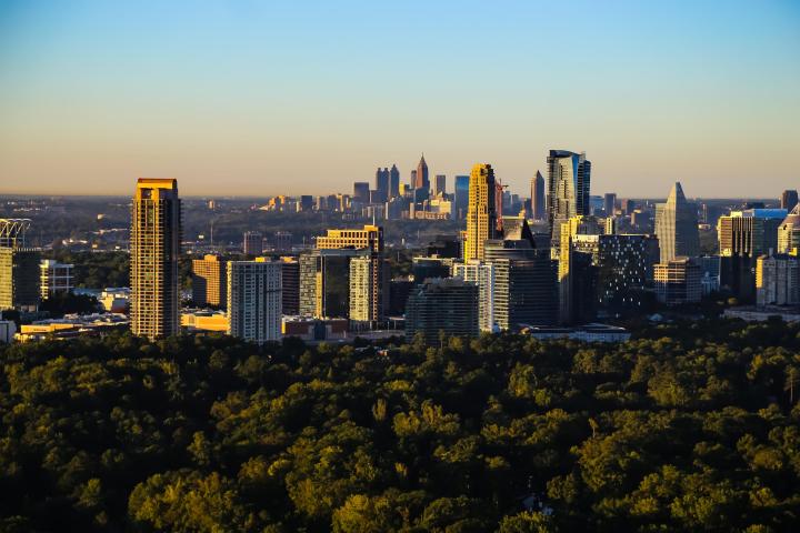 a view of a city with tall buildings in the background