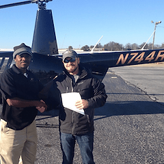 a man standing in front of a plane