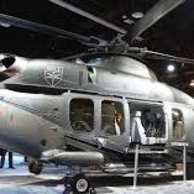 a fighter jet sitting inside of a building