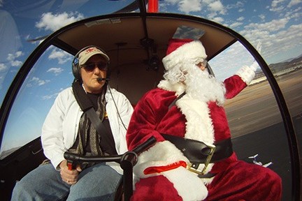 a person sitting in front of a mirror posing for the camera